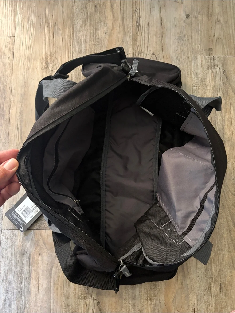Nike Black Duffel Bag with Gray Straps and White Logo